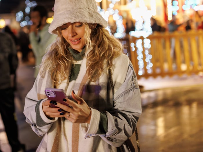 Woman on phone at the fair
